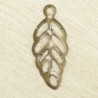 Breloque fine - Feuille ajourée - 13x6mm - Bronze