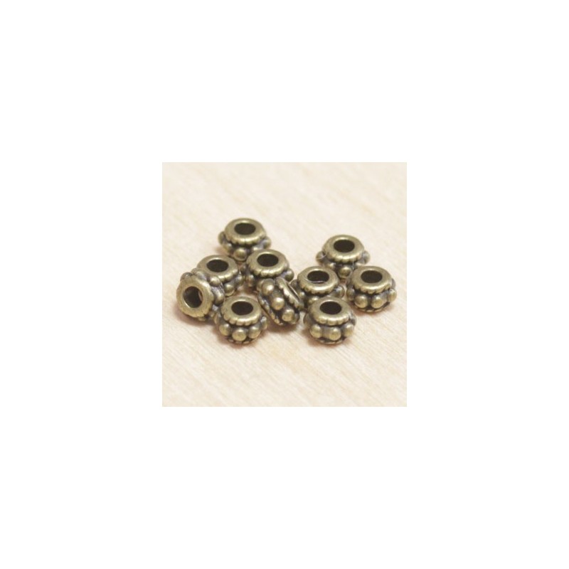 Perles métal - Rondelles - Fleur 014 - 5x3mm - Bronze - Lot de 10