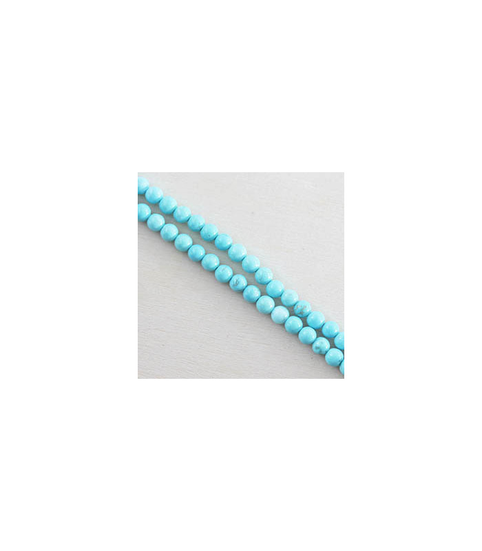 Fil de 38cm en Perles en pierre naturelle - Howlite Teintée Bleu - 4mm